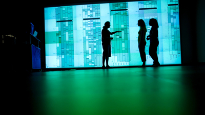 students view data on the 40-projector display wall at the National Center for Supercomputing Applications at the University of Illinois Photo by Jason Lindsey