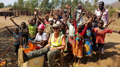 Members of the Geoscientists Without Borders team pose with Jimu villagers after the successful completion of a new village borehole.