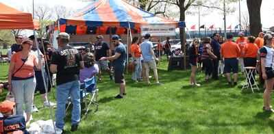 Fans tailgate before an Illini Softball game