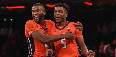 Aaron Jordan and Tevian Jones celebrate after the win