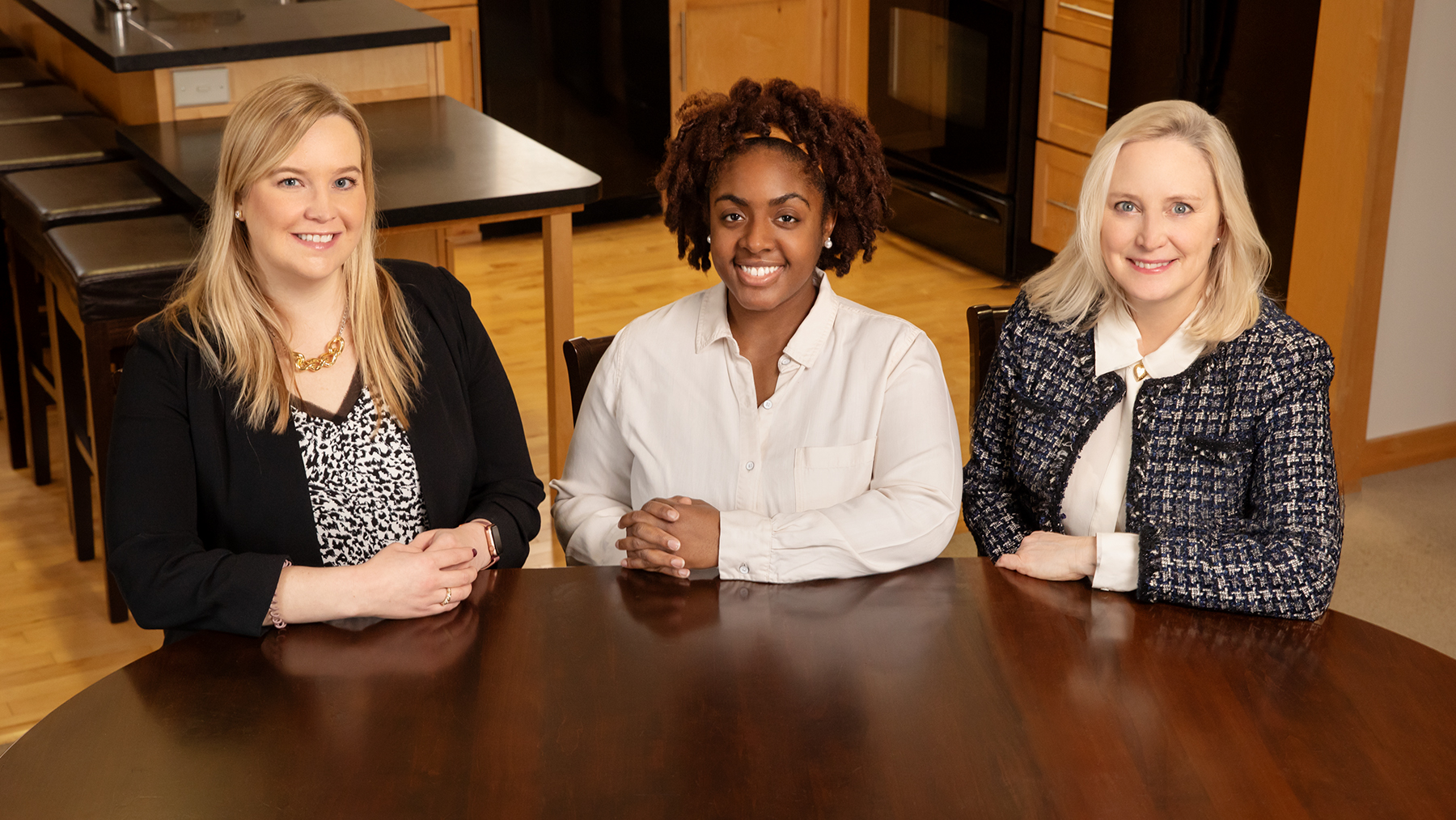 Co-authors of the study, from left, Anna Arthur, then-professor of food science and human nutrition; graduate student and first author Amirah Burton Obanla; and Brenda Koester, associate director of the Family Resiliency Center.  Photo by L. Brian Stauffer