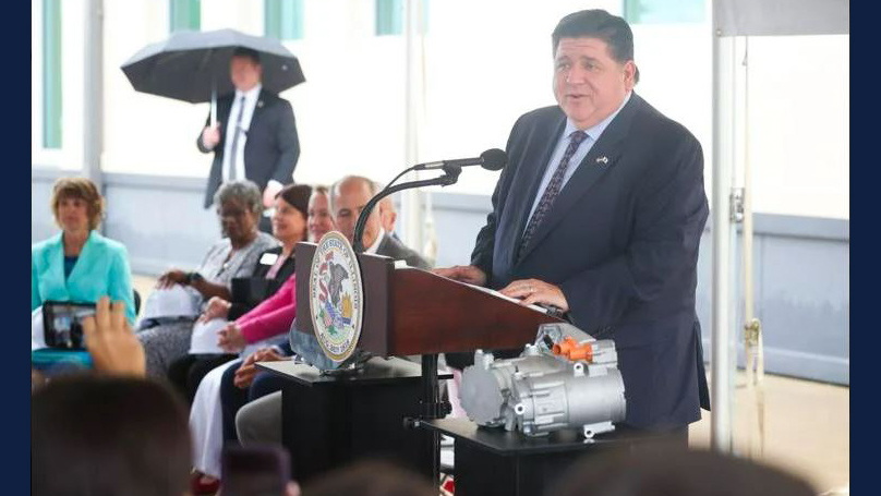 Gov. J.B. Pritzker makes remarks on Wednesday at the ground-breaking ceremony for the new Electric Vehicle Innovation Hub at TCCI Manufacturing in Decatur.  JOSEPH RESSLER, HERALD & REVIEW