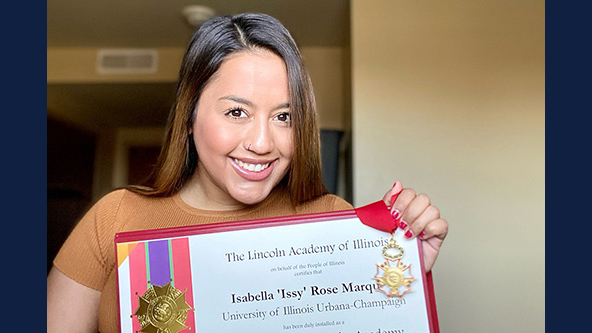 Issy Marquez displays her Lincoln Academy Student Laureate Award. (Photo submitted.)