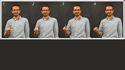 Illinois Physics graduate student Colin Lualdi demonstrates the sign for 'quantization,' which he developed as part of the recent effort by the Deaf community to develop more ASL STEM signs.
