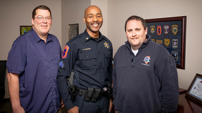Det. Eric Stiverson, Sgt. James Carter and telecommunicator Kenny Costa. Photo by Fred Zwicky