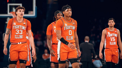 five Illini players look weary as they walk up the floor during overtime at Madison Square Garden on Tuesday night