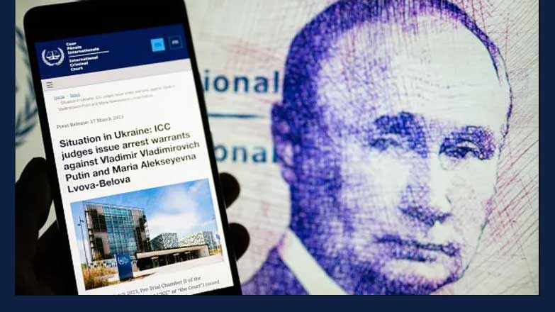 Vladimir Putin arrest warrant seen in press release from the International Criminal Court in The Hague. On 17 March 2023 in Brussels, Belgium.  Jonathan Raa | Nurphoto | Getty Images