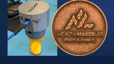 student's pillsafe prototype beside Health Make-a-Thon winner's medallion