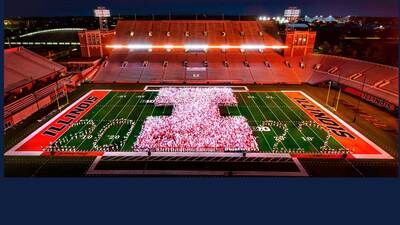 freshman class poses in a 'Block I' pattern on the football field at Memorial Stadium. Photo by Fred Zwicky