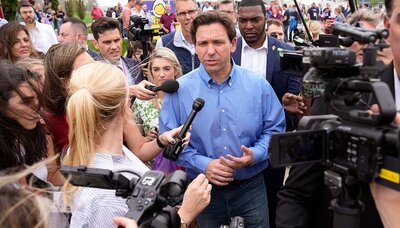 Florida Gov. Ron DeSantis talks with reporters May 13, 2023, during a fundraising picnic for U.S. Rep. Randy Feenstra, R-Iowa, in Sioux Center, Iowa. (AP)