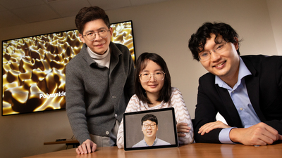 Co-authors of the study, from left, professor Jie Feng, professor Qian Chen, who is holding a photo of lead author and former postdoc Hyosung An, and professor Xiao Su.   Photo by L. Brian Stauffer