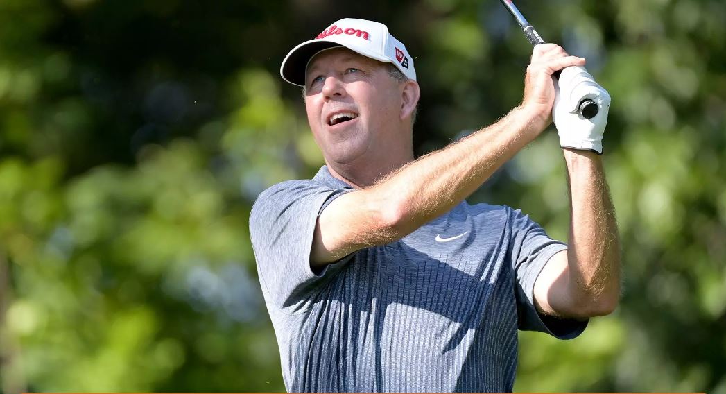Mike Small watches a shot during play of the  Illinois PGA Professional Championship