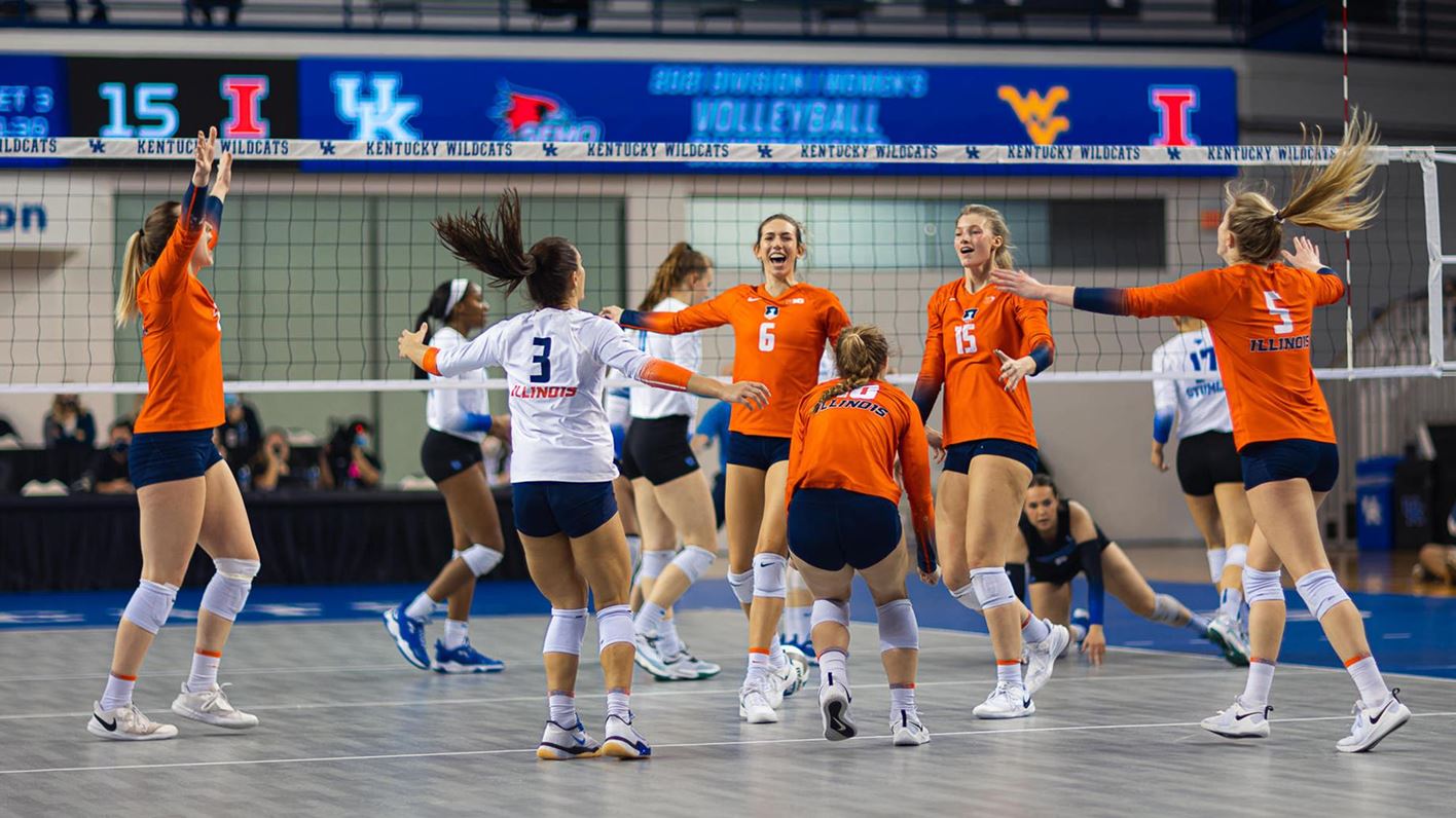 Illini Volleyball players celebrate after securing a spot in the Sweet 16