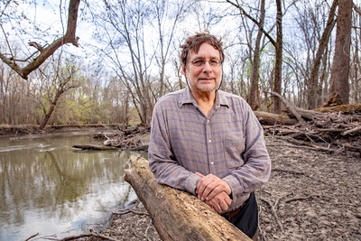 Portrait of professor Gary Parker at the Sangamon River in Mahomet, Illinois.