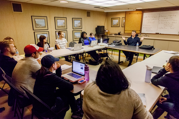 Robert Sanchez, guest lecturer and writer for the Denver-based magazine 5280, speakes to the Journalism 480: Literary Journalism class, which met at the The News-Gazette, the daily newspaper in Champaign-Urbana.