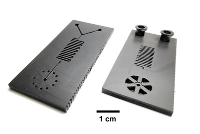 Top and bottom views of a microfluidic cartridge