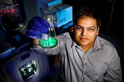 Portrait of researcher Angad Mehta in his laboratory