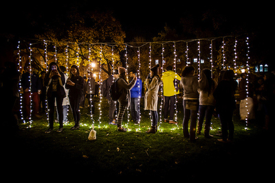 Students illuminated by lights