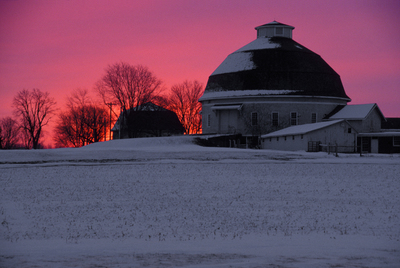 Round barns with red sky