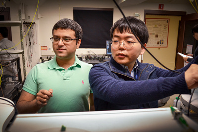 Mechanical sciences engineering professor Gaurav Bahl, left, and graduate student Seunghwi Kim confirmed that backscattered light waves can be suppressed to reduce data loss in optical communications systems.