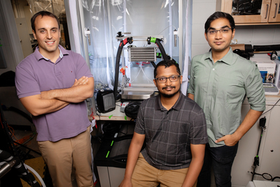Mechanical science and engineering professor Nenad Miljkovic, left, and graduate students Kalyan Boyina and Yashraj Gurumukhi collaborated with researchers at Kyushu University, Japan, to develop a system that can de-ice surfaces in seconds.