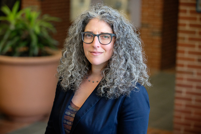 Photo of Lauren R. Aronson, an associate clinical professor of law and the director of the Immigration Law Clinic at the University of Illinois College of Law.