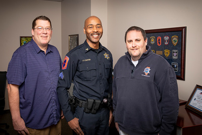 Chancellor's Medallion recipients, from left, Det. Eric Stiverson, Sgt. James Carter and telecommunicator Kenny Costa