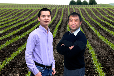 Researchers Bin Peng, left, and Kaiyu Guan led a large, multi-institutional study that calls for a better representation of plant genetics data in the models used to understand crop adaptation and food security during climate change.