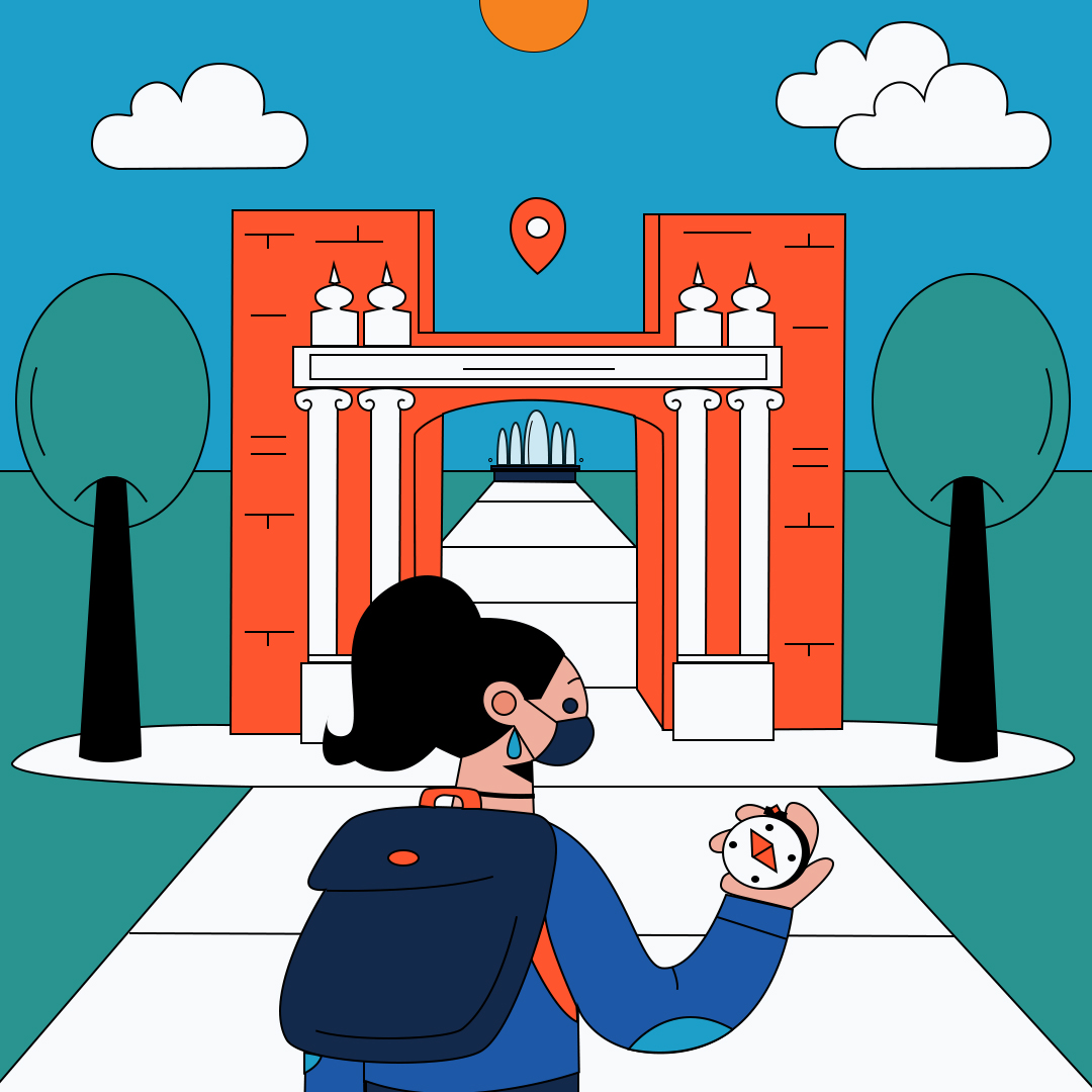 Person with compass on campus at the Hallene Gateway.