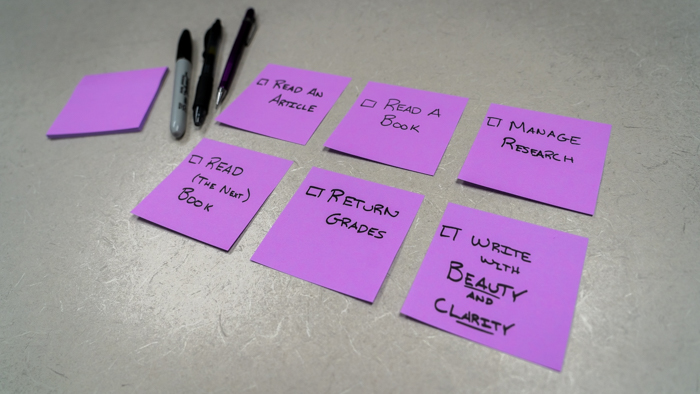 Post-It notes on a desk.