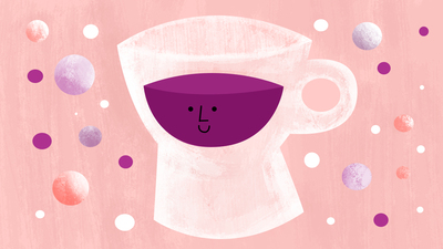 A white cup with purple liquid and a smiley face.