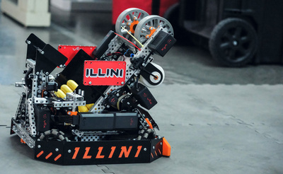 A red robot sits at rest inside the Siebel Center for Design. The robot is the creation of the Illini Vex Robotics organization. This was one of two robots the delegation from the University of Birmingham got to see during a May 15 tour.