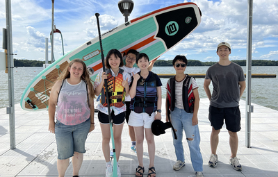 During the July 29 trip to Clinton Lake State Recreation Area, students broke off into three groups and one of the groups went kayaking and paddleboarding. Pictured here are several of the students who went paddleboarding.