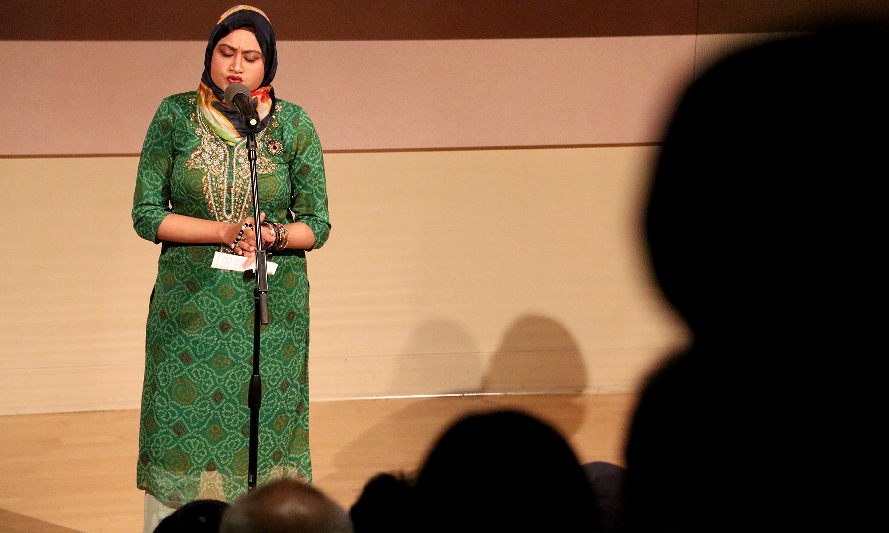 Shopto Rahman sings a Bengali folk song during the Global Talent Show on Oct. 12 inside the Spurlock Museum.  Rahman has received various national awards in Bangladesh for her singing, and on Wednesday night she added another award to her trophy case after placing second at the talent show.