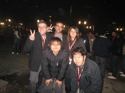 Tsubasa Akatsuka, pictured in the front row to the far right, poses with a photo with friends while in Germany as an undergrad.