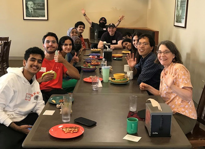 Tsubasa Akatsuka poses with KAUST students and Global Education and Training staff during a KAUST welcome lunch in September 2022.