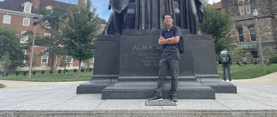 Tsubasa stands in front of "Alma," the alma mater of the University of Illinois Urbana Champaign.
