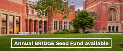 fall image of the birmingham campus with message announcing bridge seed fund