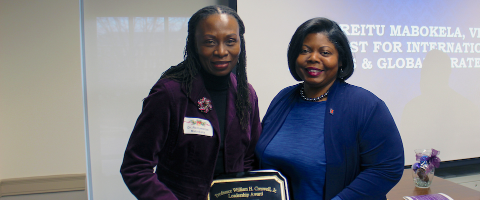 vice provost mabokela accepts creswell award plaque from dr. danita brown young