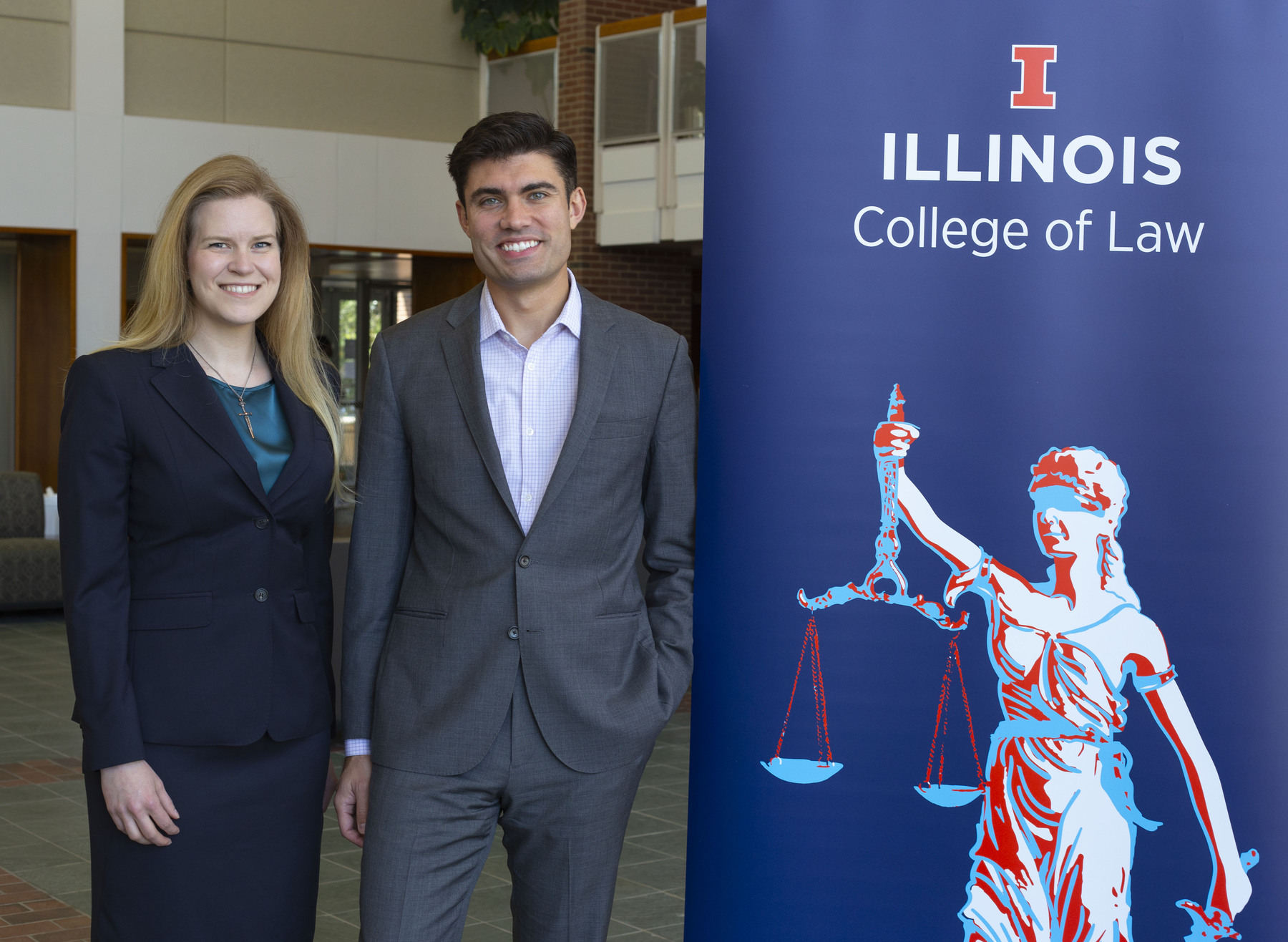 Elizabeth Nielsen and Robert Harding stand in the College of Law Pavillion