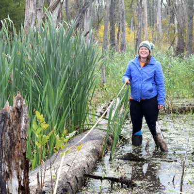 Caitlin Rankin conducting wetland sampling