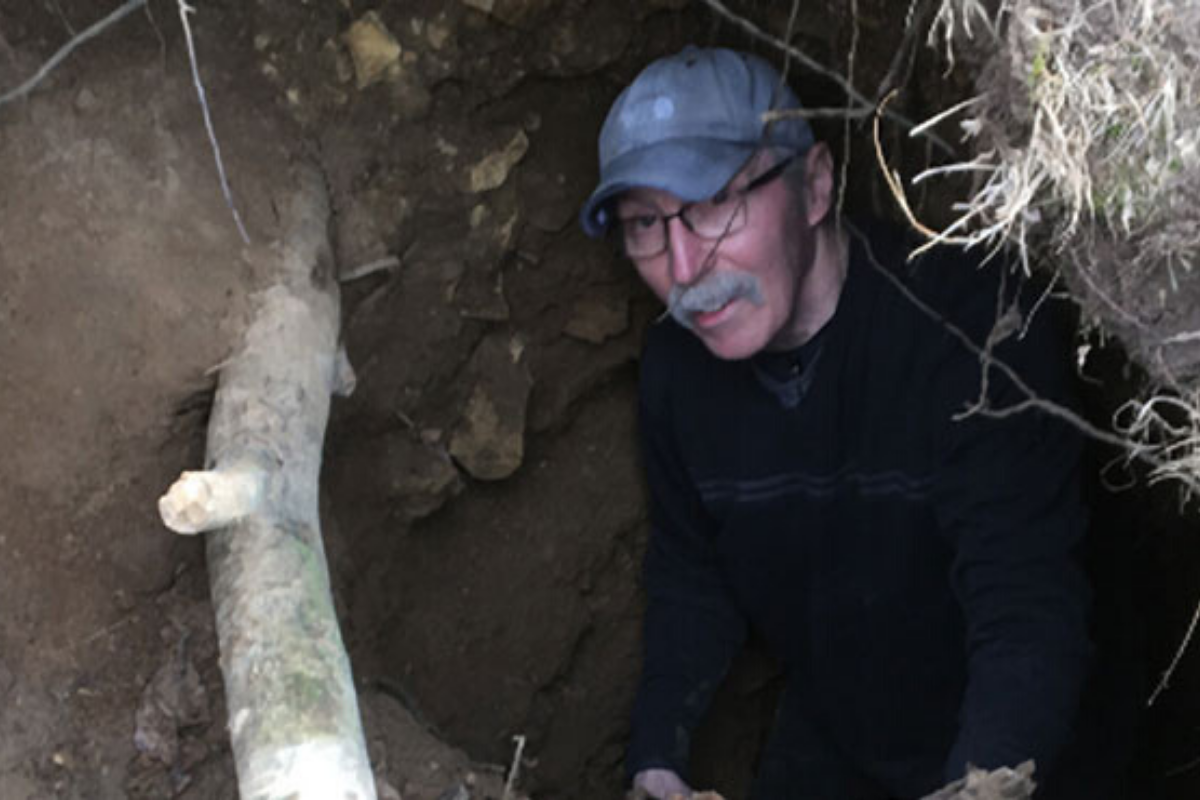 geologist Sam Panno explores Calf Cave in Joe Daviess County