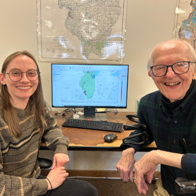 NIFS staff member Allison Densmore shows George Johnson how researchers are using his donated collections for a research project on the distribution of projectile points in Illinois. Photo credit: Clare Tolmie