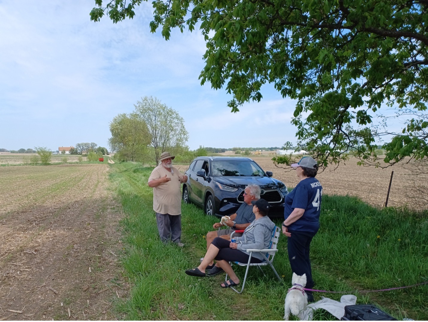 Dr. Bob McCullough (ISAS) talking with members of the McKeown family about the geophysics survey of the site. Photo credit: John Lambert.