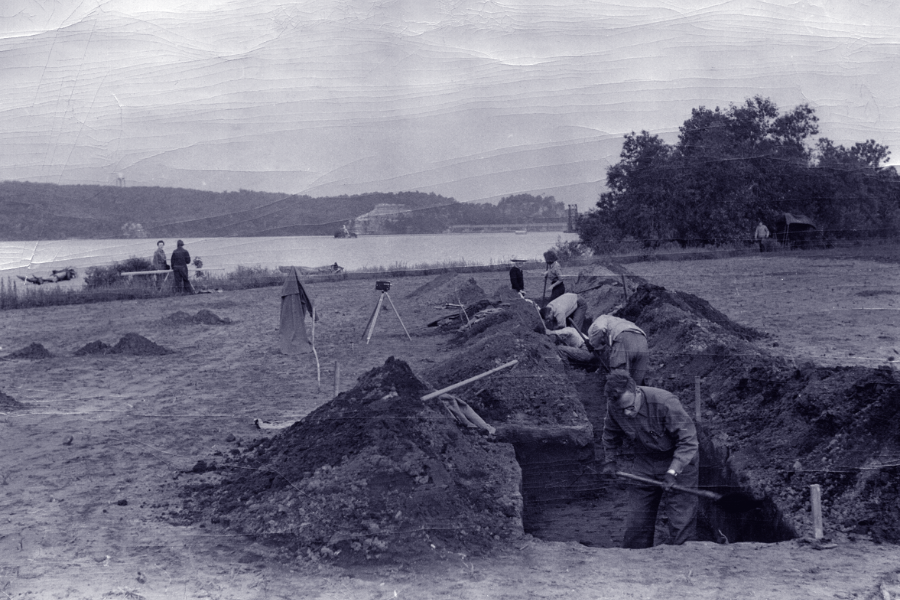 archaeologists digging an excavation