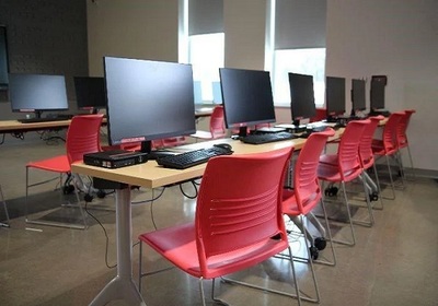 chairs and computers in a classroom