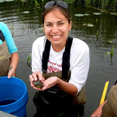 Katie O'Reilly holding a turtle