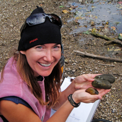 Sarah Douglass holds freshwater mussels