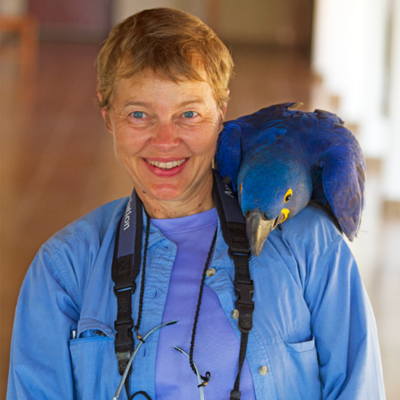 Susan Post with blue parrot