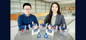 Weichen Li, left, and professor Shelly Zhang, right, sitting at a table with their soft robotics and metamaterials design.